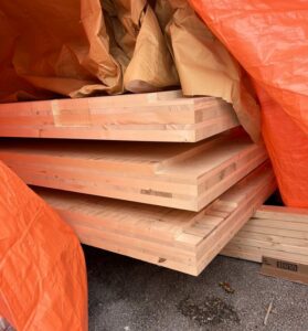 timber under a tarp